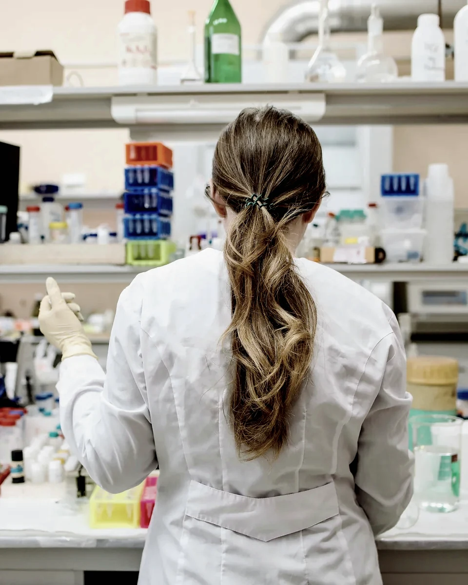 A researcher working at a laboratory bench
